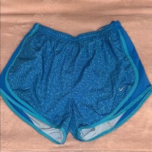 Blue nike running shorts